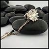 Cheryl's snowflake tie tac with formal backing