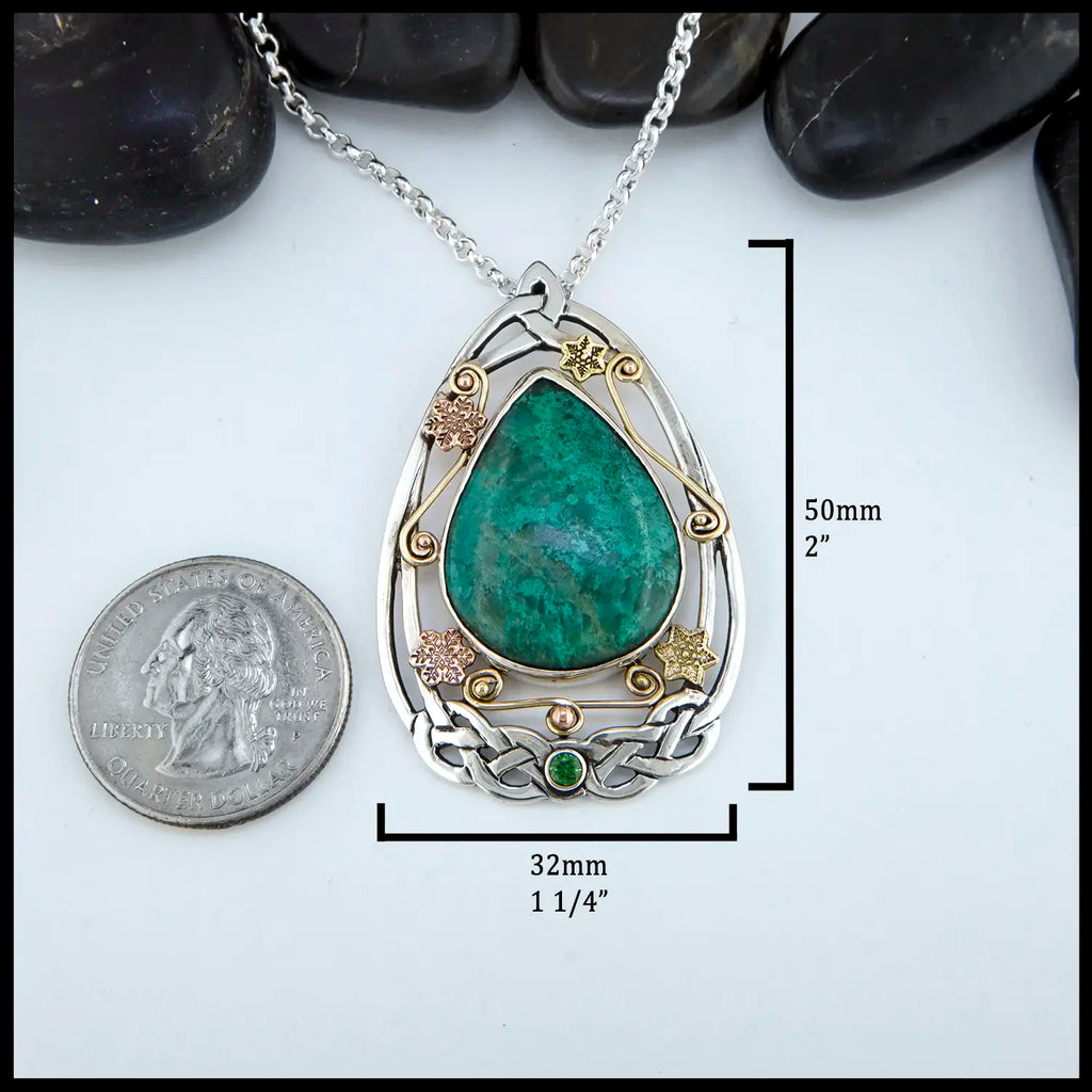 Chrysocolla and Tsavorite stones set in a custom Sterling Silver Frame, with gold accents 50mmx 32mm