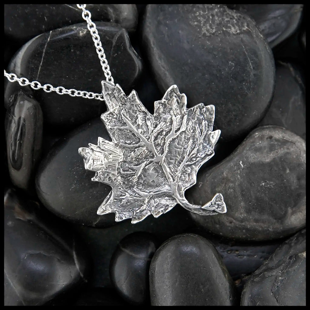 Trinity Knot Maple Leaf Pendant in Sterling Silver