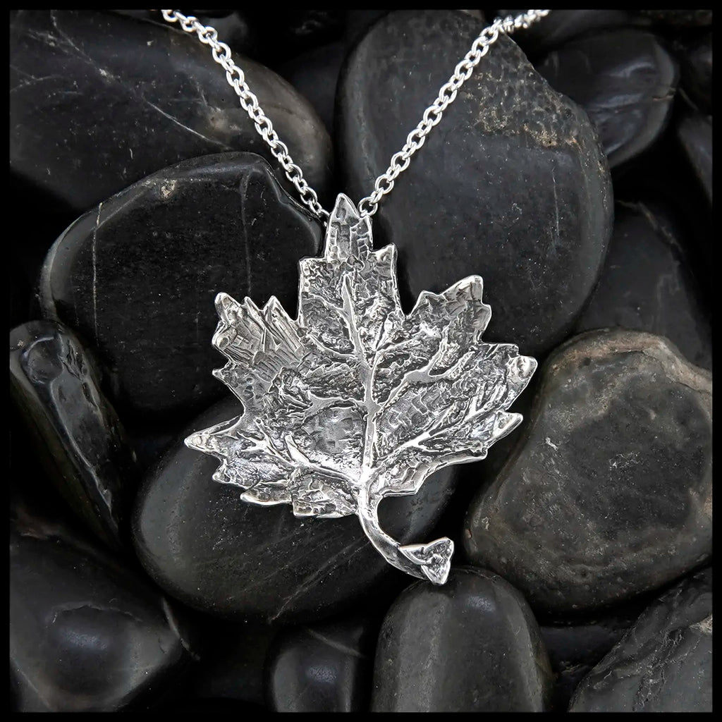 Trinity Knot Maple Leaf Pendant in Sterling Silver