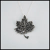 Trinity Knot Maple Leaf Pendant in Sterling Silver