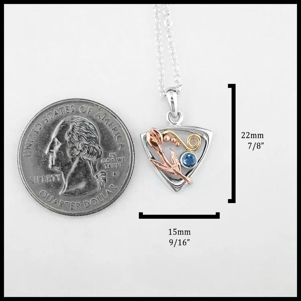 This Pendant is 20mm or 7/8" Tall and 15mm or 9/16" Wide.
