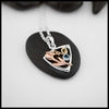 The latest necklace from out Craftsman Nicole! A Sterling Silver Triangular Frame Pendant with a 14K Yellow Gold Swirl accenting the top, a 14K Rose Gold Tulip & beading on the right side adjacent to a bezel set Aquamarine on the left. Includes an 18" Cable Chain 