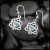 Sterling Silver Trinity Heart  Earrings set with a 4mm Blue Topaz. This is a Limited Edition Set.