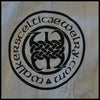 Logo of Celtic jewelry brand on the left sleeve of the Father's knot Shirt