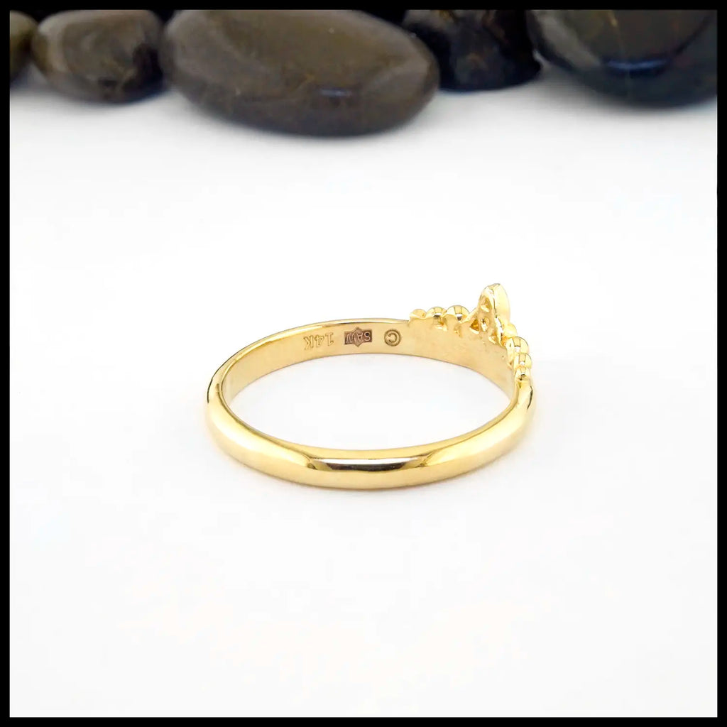 Gold ring with "14K" stamp and "SAW" copyright protected Maker's Mark.