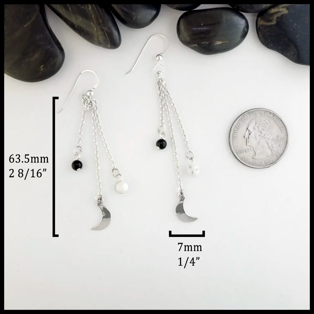 Sterling Silver crescent moon chained drop earrings with onyx and howlite beads. Measuring at 7mmx63.5mm