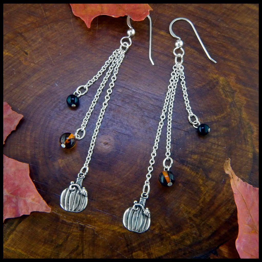 Pumpkin chained drop earrings in silver with beaded amber and onyx