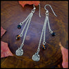Pumpkin chained drop earrings in silver with beaded amber and onyx