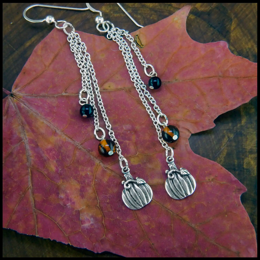 Pumpkin chained drop earrings in silver with beaded amber and onyx