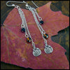 Pumpkin chained drop earrings in silver with beaded amber and onyx