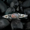 Crazy Lace Agate cuff bracelet set in a Sterling Silver Frame, with sterling silver tulips and beads, with 14K rose gold-filled swirls.