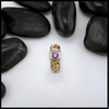 Pink Spinel ring set in tri-color gold Celtic ring