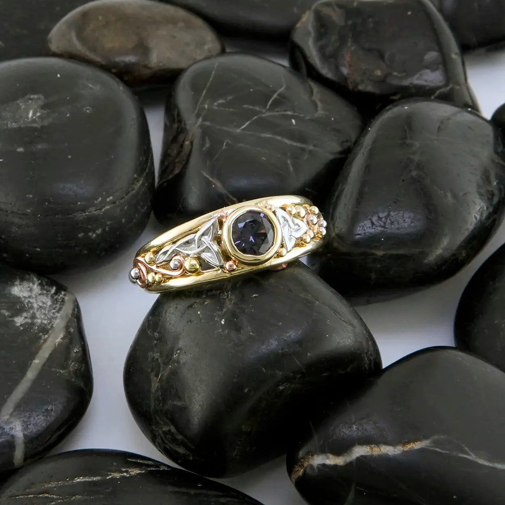 Purple Spinel Gemstone in gold Celtic ring
