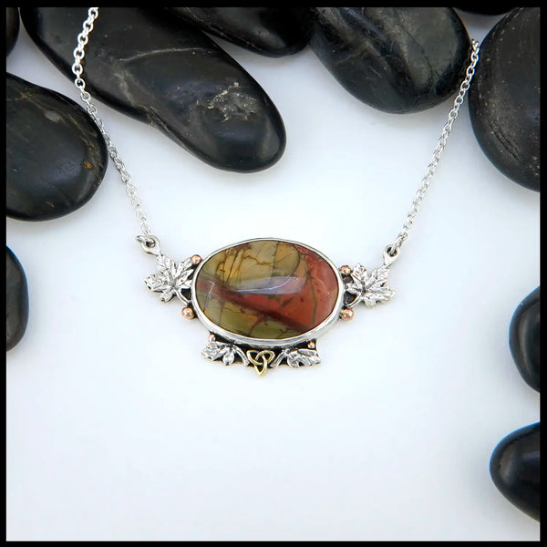 Red Creek Jasper set in sterling silver with gold accents