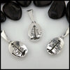 Sea Sediment Jasper with pine tree cut out on the back of the pendant in Sterling Silver
