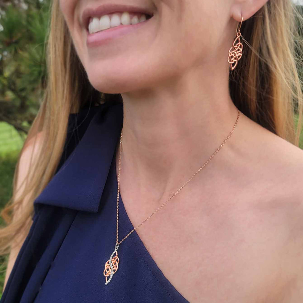 Le Chéile pendant and earrings in 14K rose gold, worn