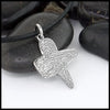 ash cross pendant on black cord 