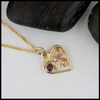 dainty heart pendant in gold