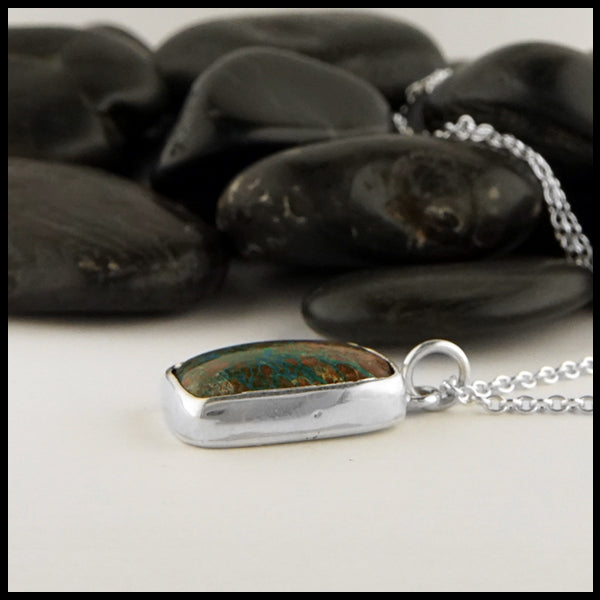 profile view of azurite pendant