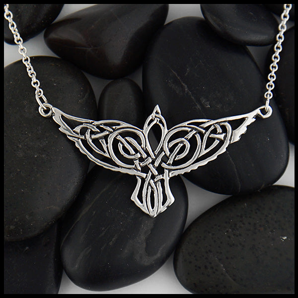 Sterling Silver celtic knot Raven pendant on attached cable chain.