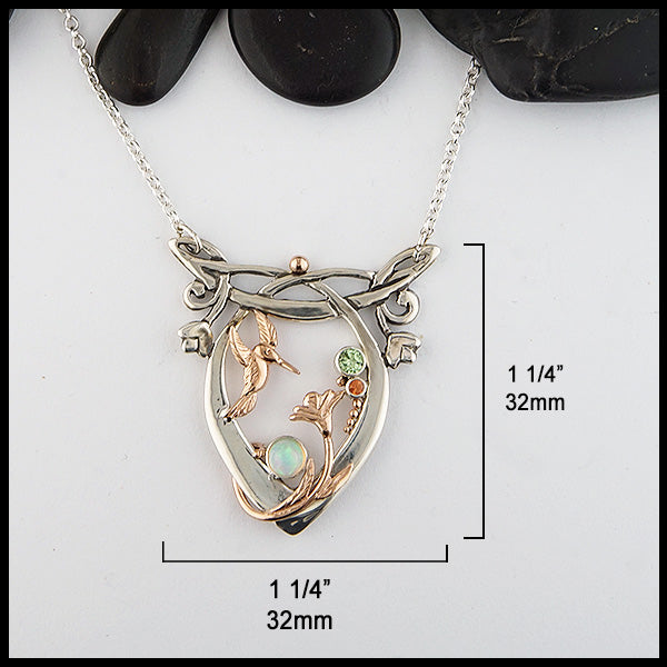 Whimsical Hummingbird Necklace measures 1 1/4" by 1 1/4".