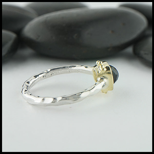 Profile view of rose cut green tourmaline ring in silver and gold