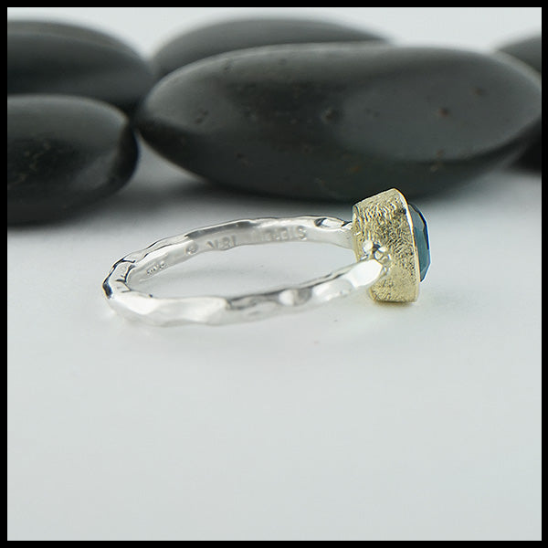 Profile view of rose cut blue tourmaline ring in silver and gold