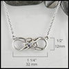 Infinity Knot birthstone Pendant in Sterling silver measures 1/2" by 1 1/4"