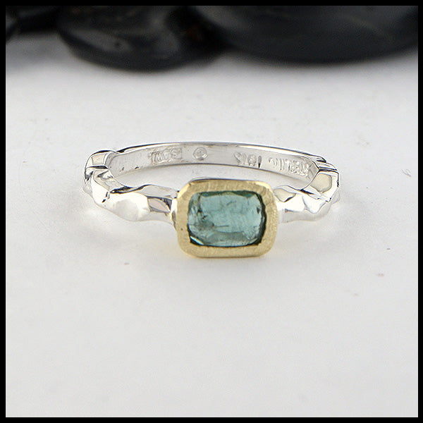 Rustic hand fabricated ring in sterling silver with an 18K yellow gold bezel, set with a Rose Cut Mint Green Tourmaline.