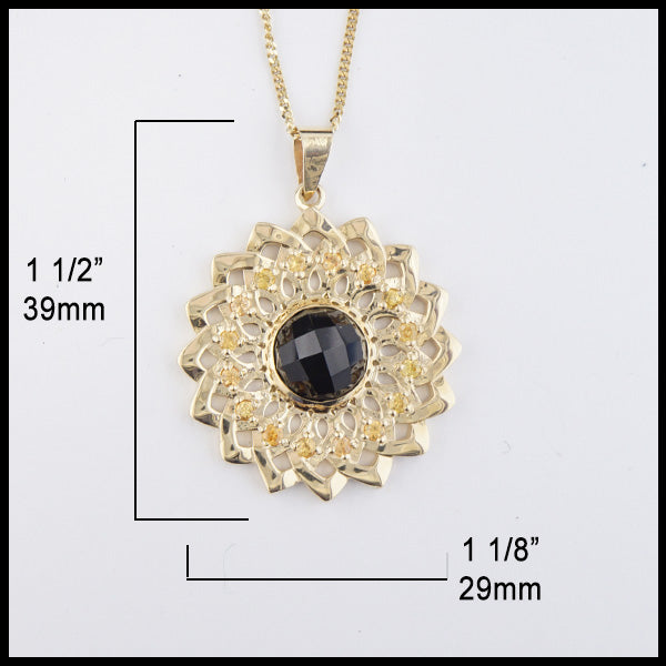Pendant measures 1 1/2" by 1 1/8".