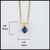 5mm Ceylon Blue Sapphire set in a 14K yellow gold setting with an 18" 14K Yellow Gold light curb chain. Measurements are 1/4" by 3/8".