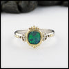 Opal trinity ring with 0.54ct Black Opal and 14K White trinity accents and 18K Yellow Gold. 