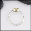 Profile view of Sterling Silver and 18K yellow gold ring set with a Rose Cut Green Tourmaline.