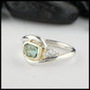 Sterling Silver and 18K yellow gold ring set with a Rose Cut Mint Green Tourmaline with trinity knot accents.