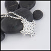MacDurnan cross pendant in sterling silver. 