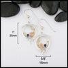 Drop earrings measure 1" by 5/8". 