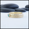Josephine's Knot band in 14K Yellow gold with Emerald