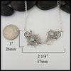 Pendant measures 1" by 2 1/4"