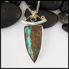 Custom Opal pendant in Sterling Silver and 18K Yellow Gold set with an accented oval tourmaline.