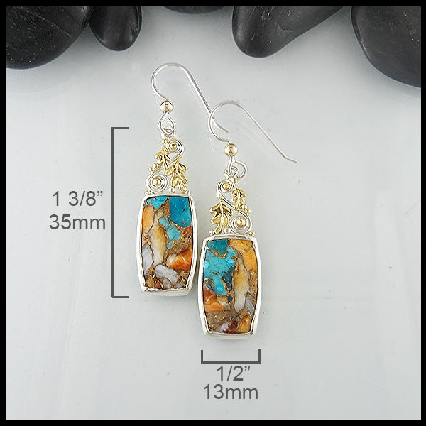 Earrings measure 1 3/8" by 1/2"