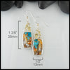 Earrings measure 1 3/8" by 1/2"
