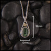 Pendant measures 13mm by 32mm