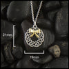 Ce;ltic wreath with gold bow measures 21mm by 19mm