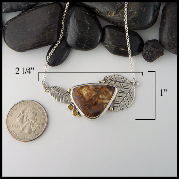 Pendant measures 2 1/4" by 1"