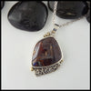 Boulder Opal and Heart Knot Pendant in Sterling Silver and 18K Yellow gold