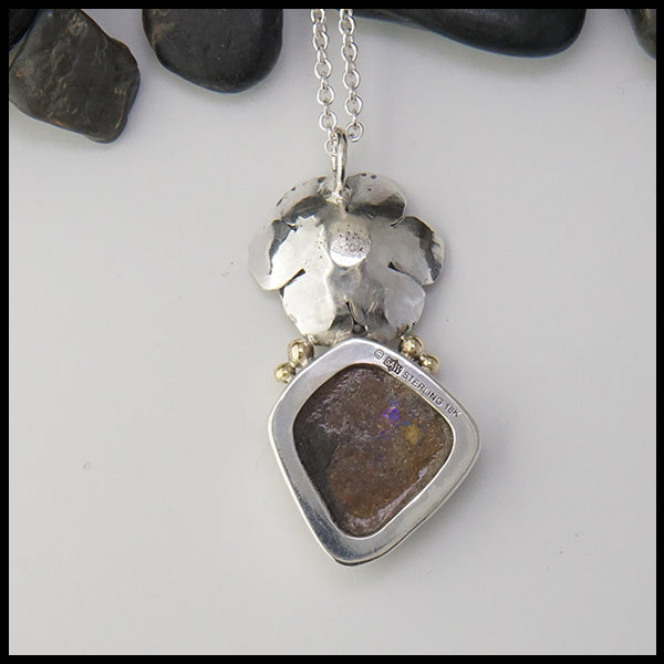 Reverse view of Floral pendant in sterling silver, 14K rose gold, 18K yellow gold with Australian opalized wood. 