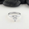 Pear shaped diamond engagement ring in white gold