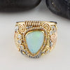 Ethiopian Opal Ring in yellow, rose, and white gold