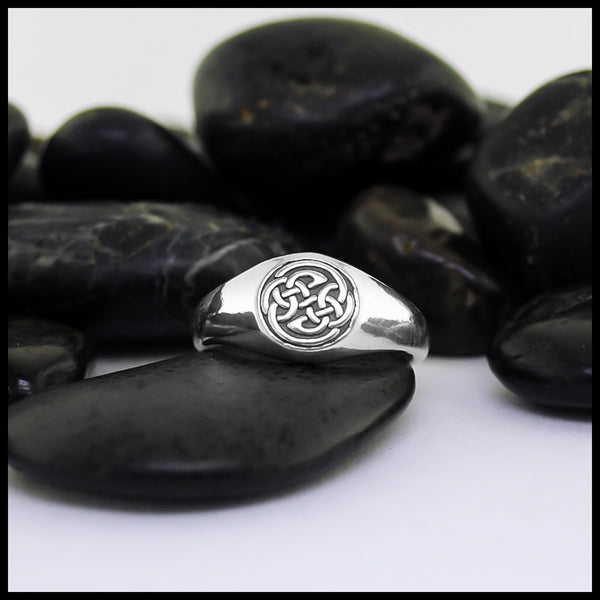 Ring propped on a rock